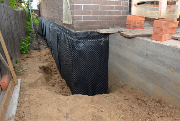 Happy homeowners after waterproofing job in Ohio City